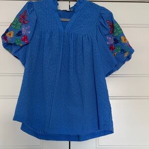 Umgee embroidered sleeve top.